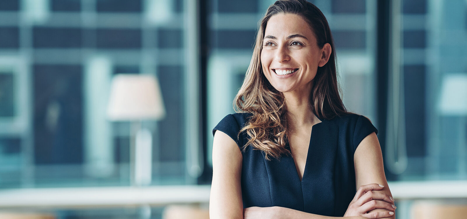 Portrait of a businesswoman standing in a a modern office