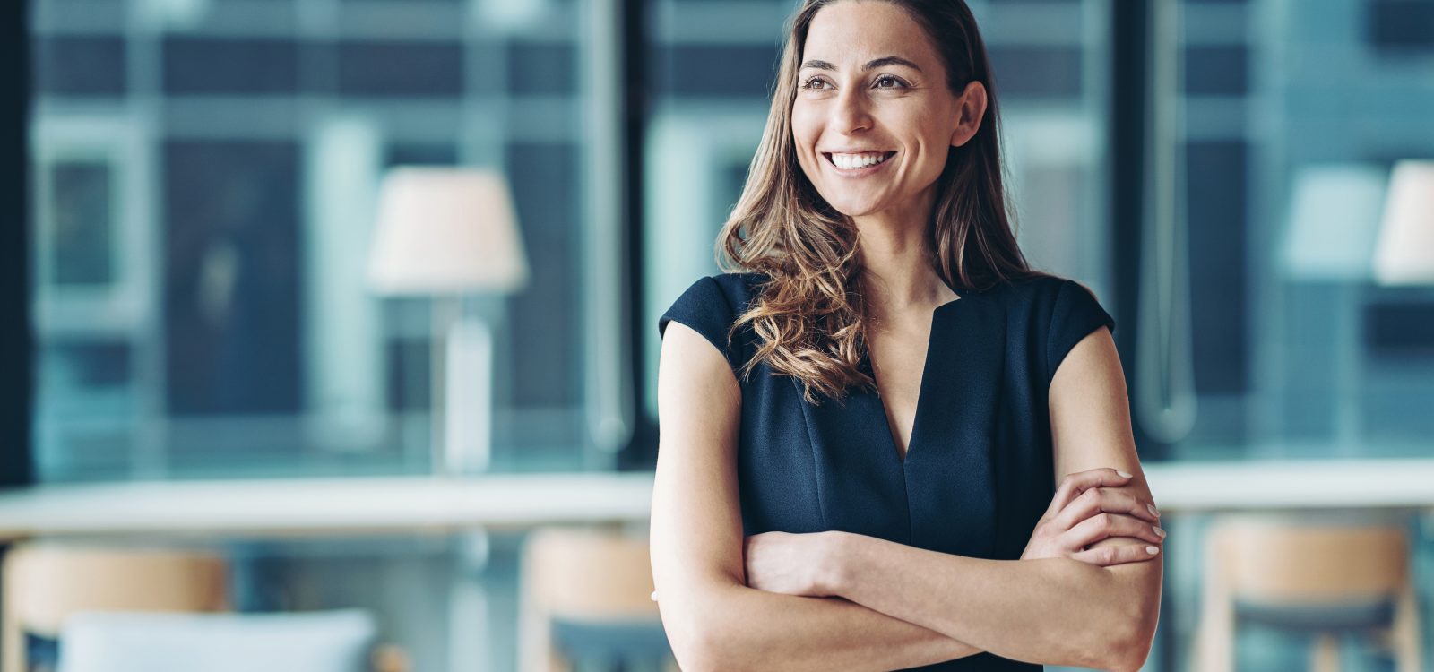 Portrait of a businesswoman standing in a a modern office